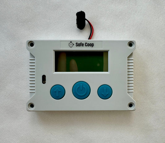 Replacement Safe Coop® door controller front panel.